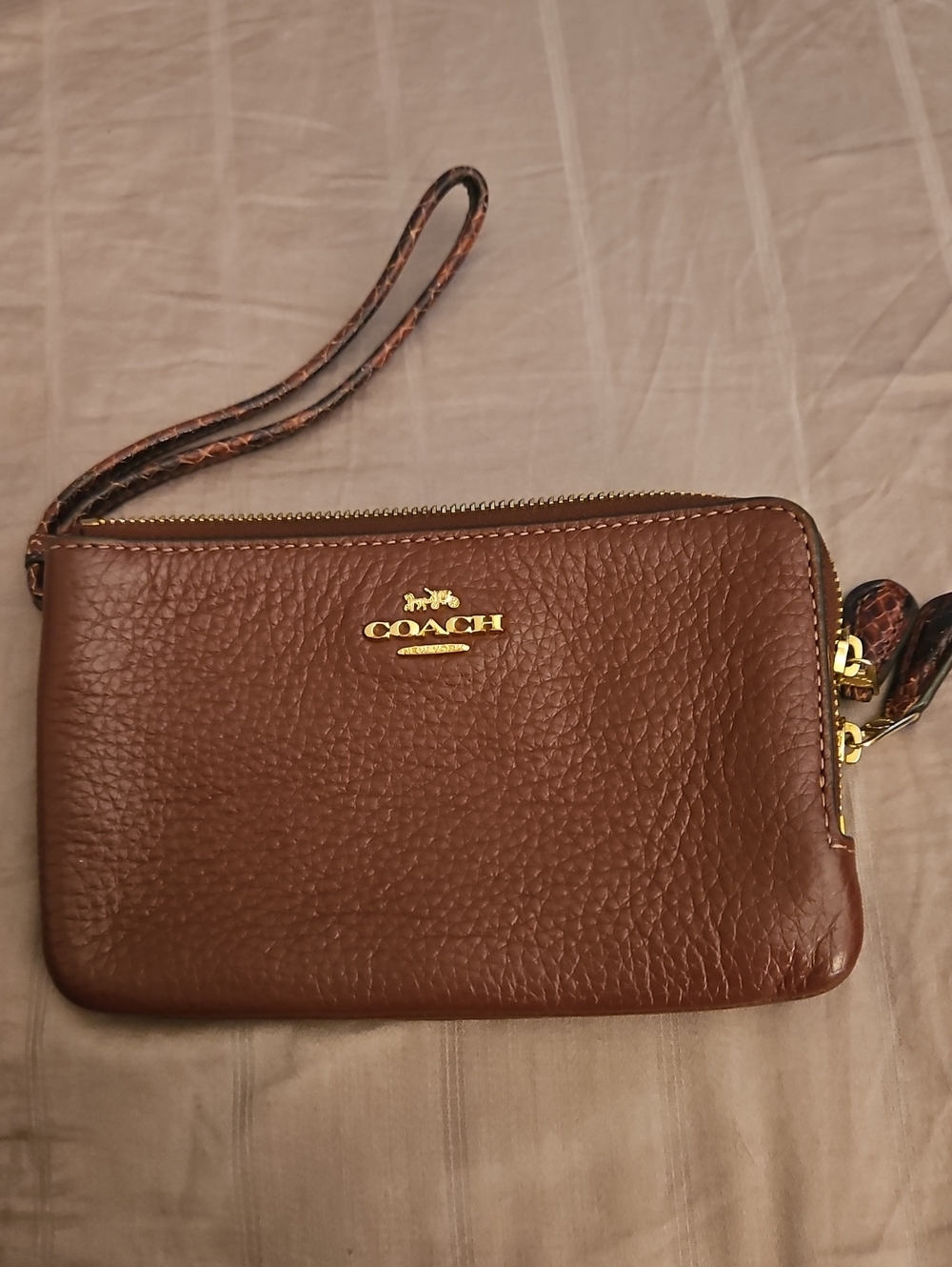 Coach Wine Pebbled Leather Wristlet with Gold Logo